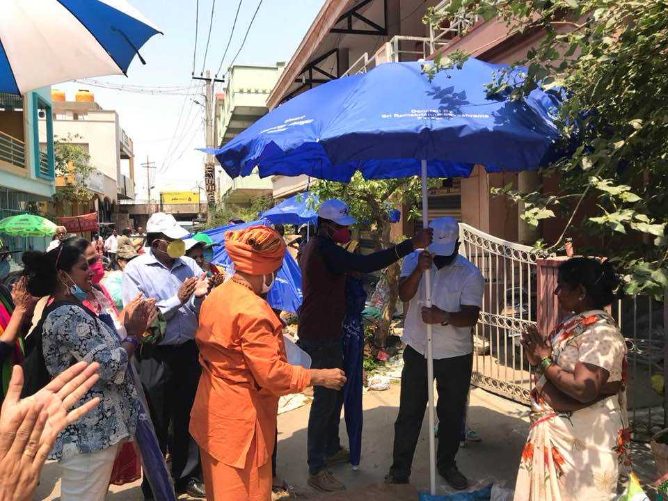 Umbrella distribution at Pavagada for the street venders. This was by the Sri Ramakrishna Sevasrama, Pavagada. The  temparature is at Pavagada now a days are reaching 40 degree celcsius. The  voulnteer support by Infosys - Samarpan team. This took place on the 30th of April 2022.