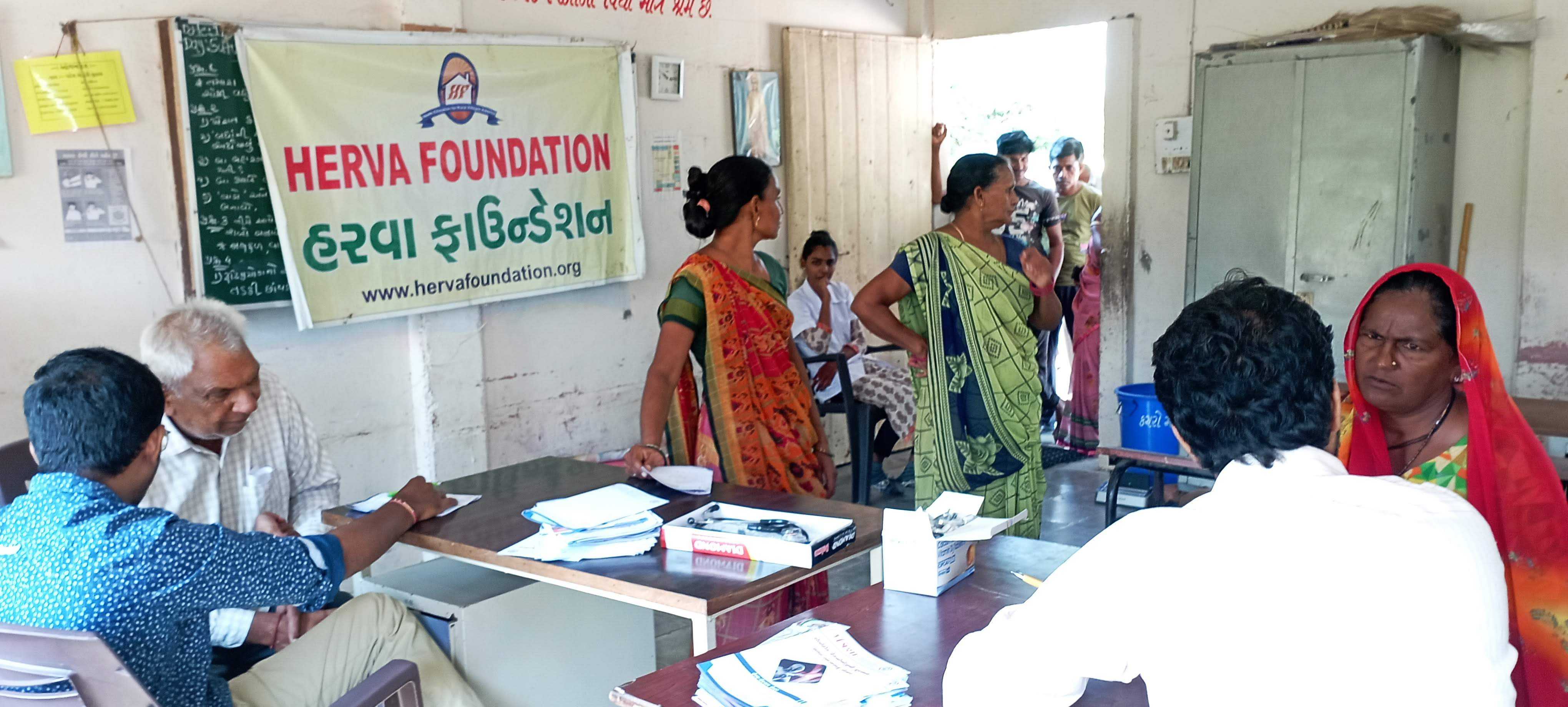 On 1st Oct 2022, Herva Foundation jointly with the Rotary Club of Ahmedabad North had an Eye camp and Orthopaedic camp at village Kevadiya, a small village in Kapadvanj Jilla in Kheda district.
Free EYE CAMP: 245 registered In eye care (male 116 and female 129 ) of which 56 senior citizens (Male 39 and 17 female) . Four students were found with eye problems. Distributed 190 Spectacles. 11 persons were found to have Cataracts and have been referred to Kapadvanj Hospital for a free operation. Special thanks to Dr Charturbhai Patel and Dr Dashratbhai Patel for their managing the eye camp. 
Free ORTHOPAEDIC CAMP: Trisha Multispeciality Hospital, Ahmedabad had come with their team. 92 villagers registered. Free medicines were given and a few were suggested for operations at Ahmedabad. 50 people were X rayed through a portable X-ray machine and advised for appropriate further treatment.
The villagers could get the benefit of getting an X-ray at their doorsteps. They had to go to the nearest city to avail of such a facility.
